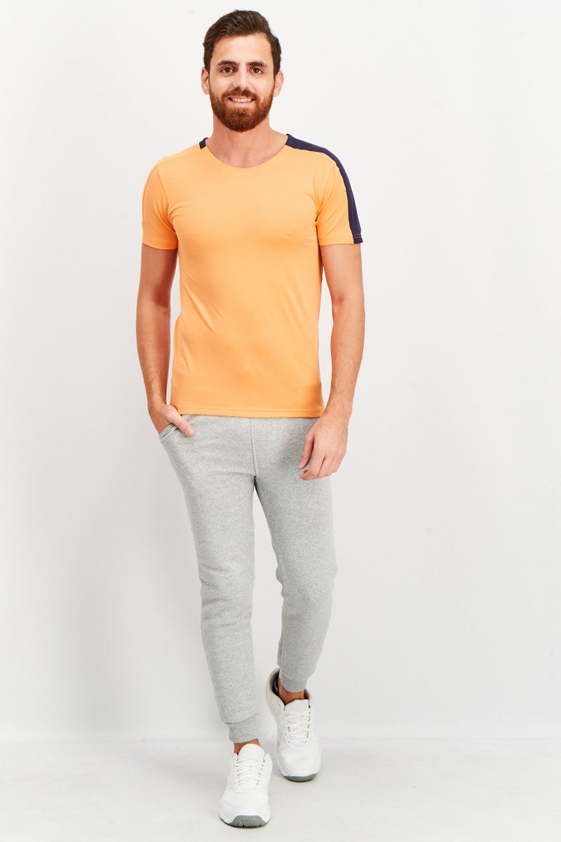 PUMA تي شيرت تدريب بومّا x فيرست مايل للرجال بقصة عادية بشعار العلامة التجارية، برتقالي - Image 2